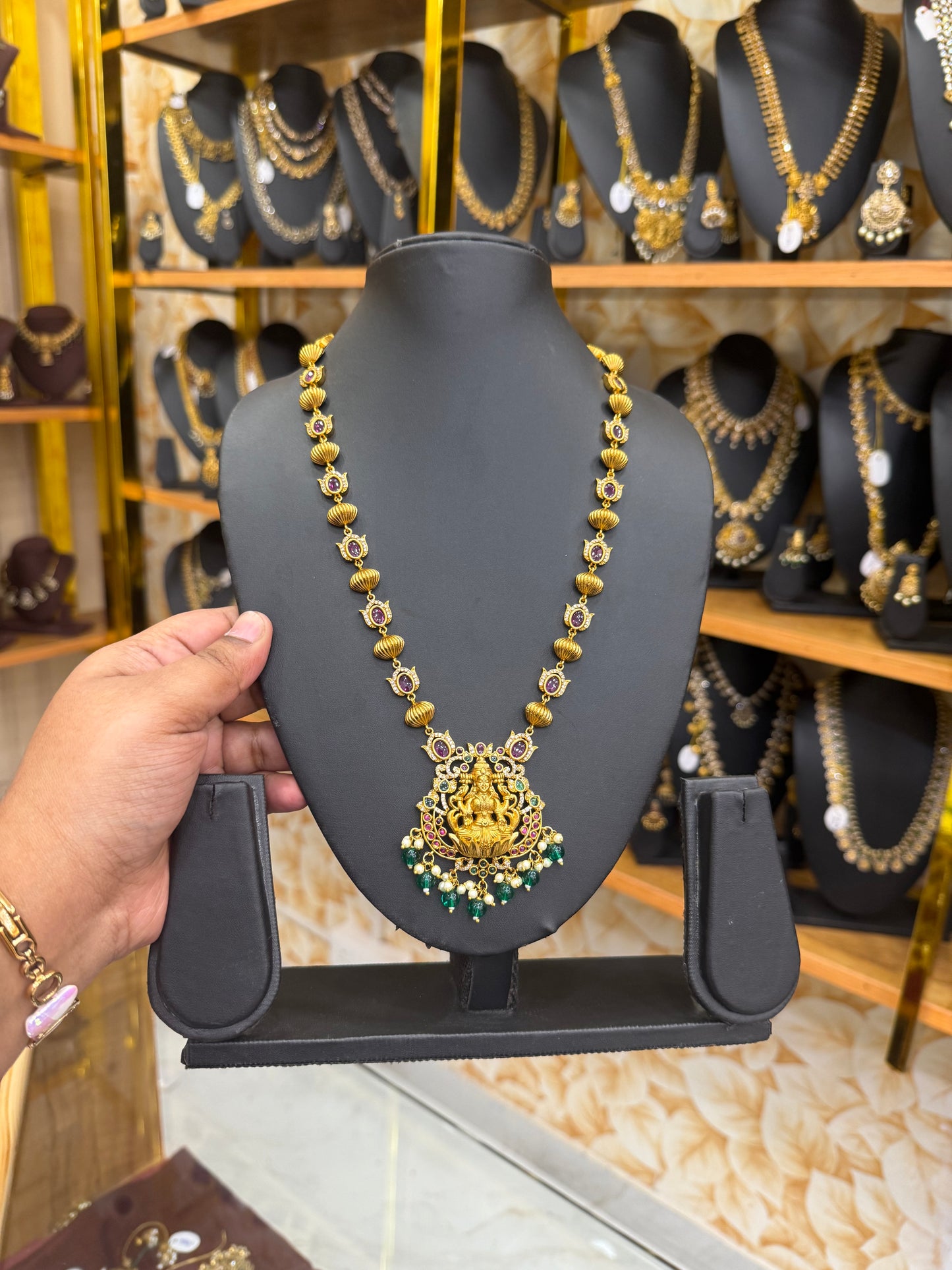 Elegant Lakshmi haram with green beads