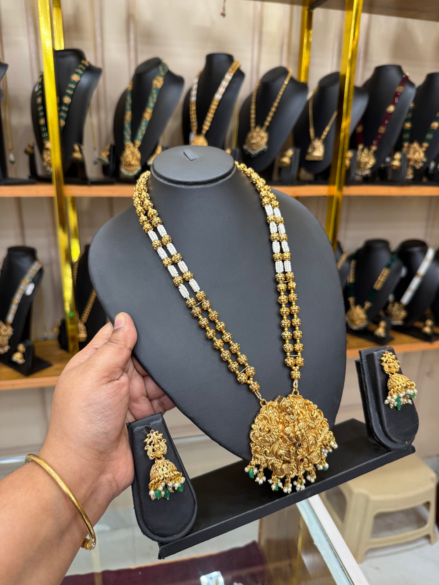 White beads & Golden Muthu mala with 3D Lakshmi pendant