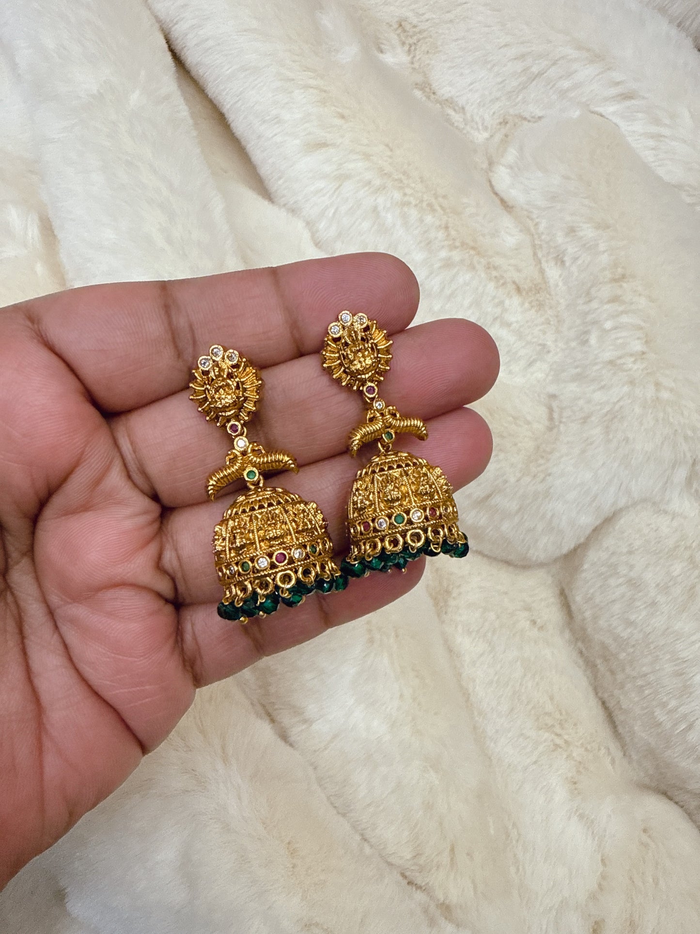 Lakshmi with peacock jumka