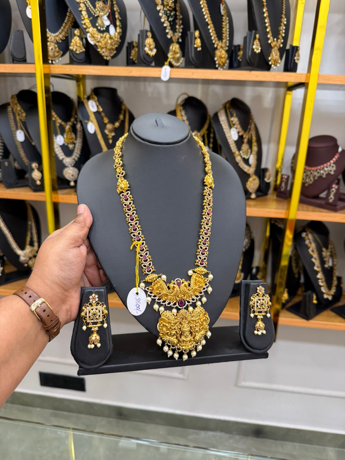 Gold replica ruby stone with Lakshmi pendant