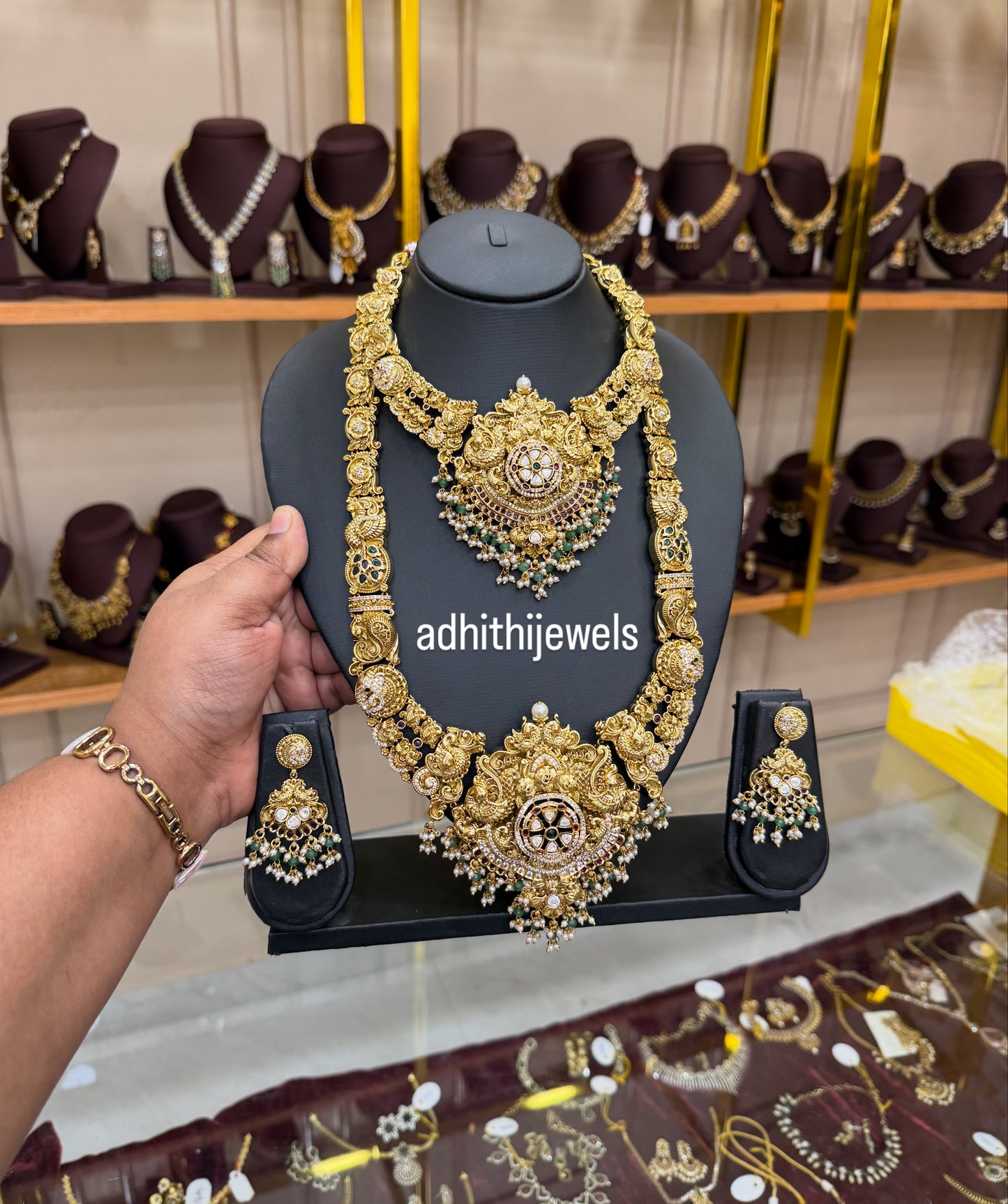 Stunning gold replica bridal combo with stone work