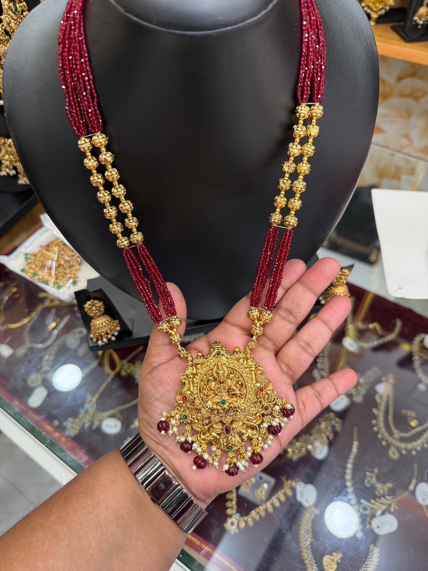 Red beads with Golden Muthu mala with 3D Lakshmi pendant