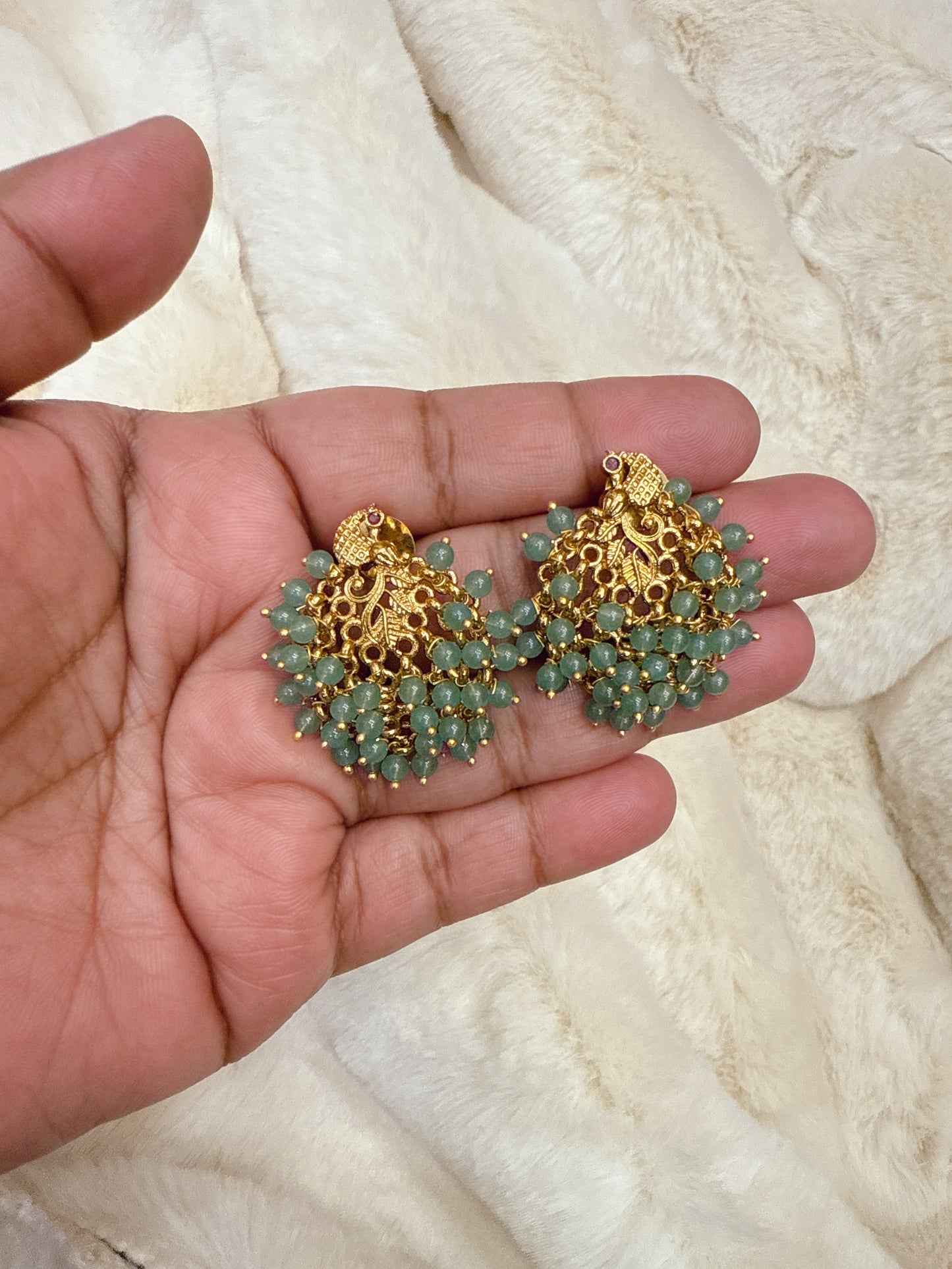 Pastel green peacock beads earring