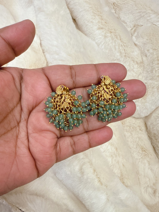Pastel green peacock beads earring