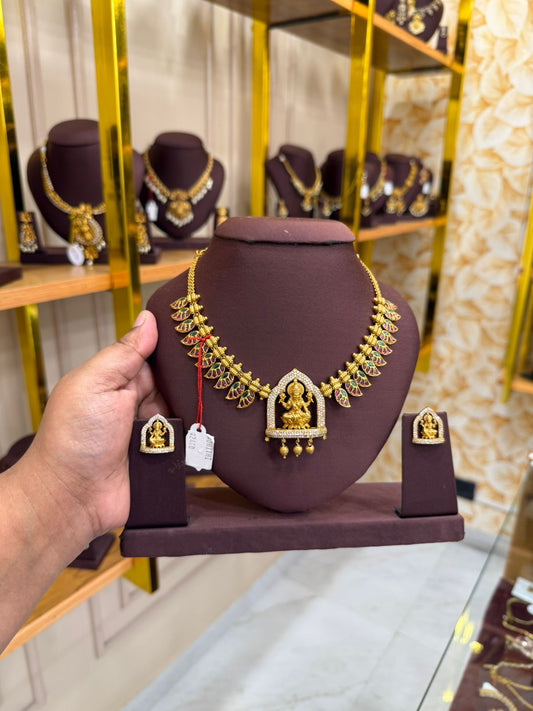 Temple Ganesha Pendant Necklace with Enamel Leaf Design & Earrings