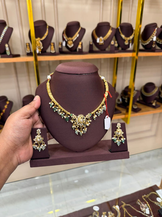 Pastel green peacock stone necklace