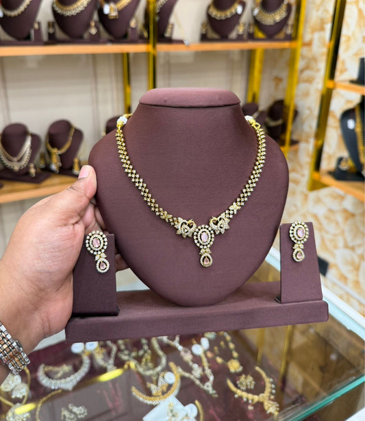Kundan-Style Gold-Plated Necklace and Earring Set with Pink and White Stones